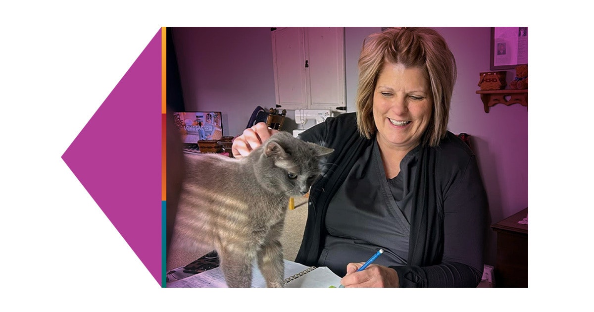 winners social WEB Nurse winner has her picture taken with her cat